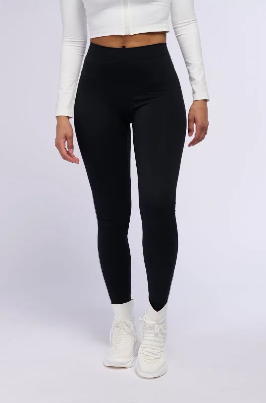 ON THE RUN RUCHED LEGGING IN BLACK